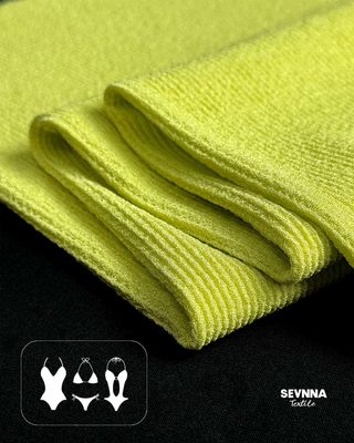 180cm幅、285gsm重量、93%リサイクルポリエステル+7%スパンデックス配合のプレミアムスポーツブラ生地。高性能ジムブラ素材。